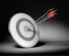 A dart circle with three darts in the centre.